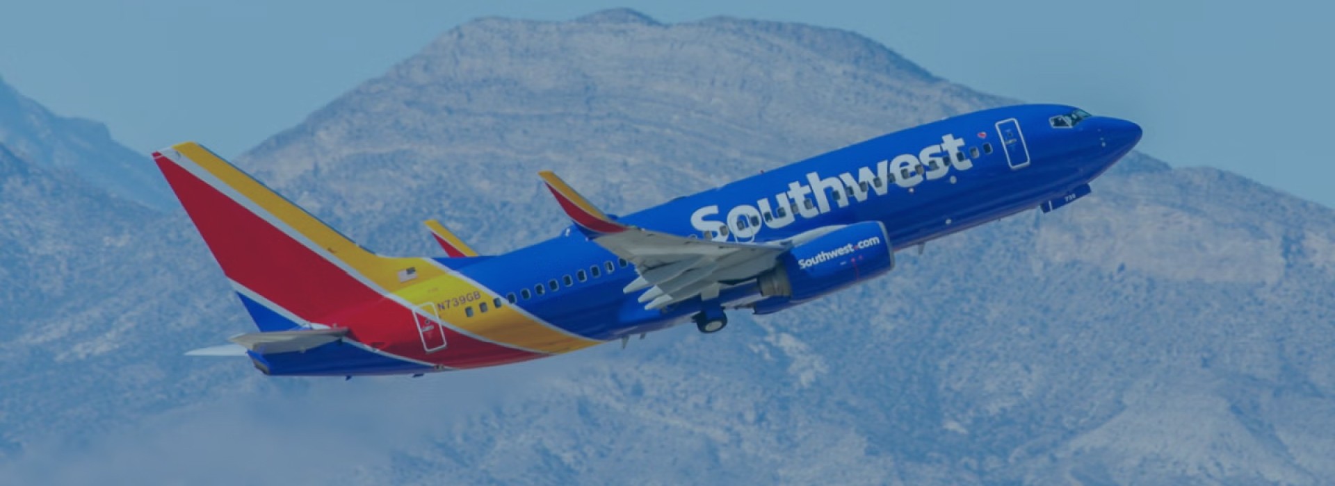 Southwest Airlines aircraft at airport gate offering affordable flights across the United States